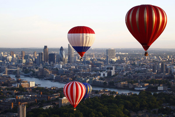 Hot air balloons rise over London