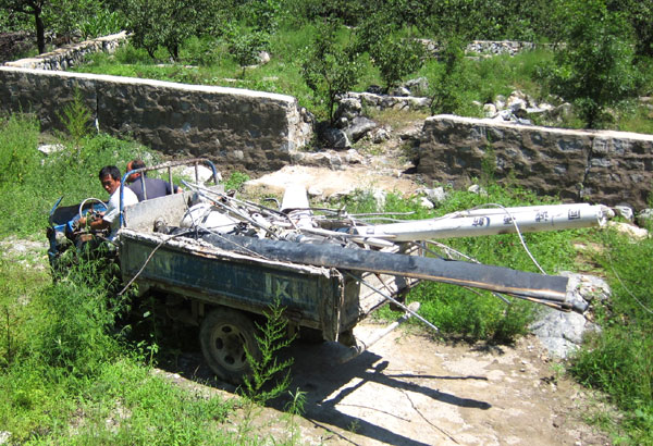 Light helicopter crashes in Beijing suburb, one pilot killed