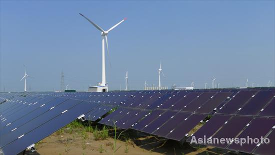 Wind and sun harnessed to cut emissions