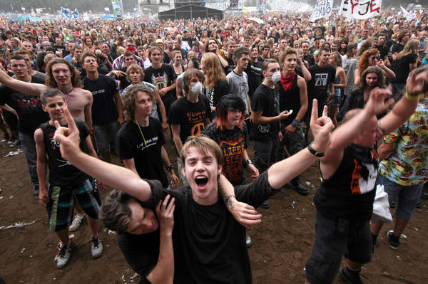 Revellers play in mud at Woodstock Festival