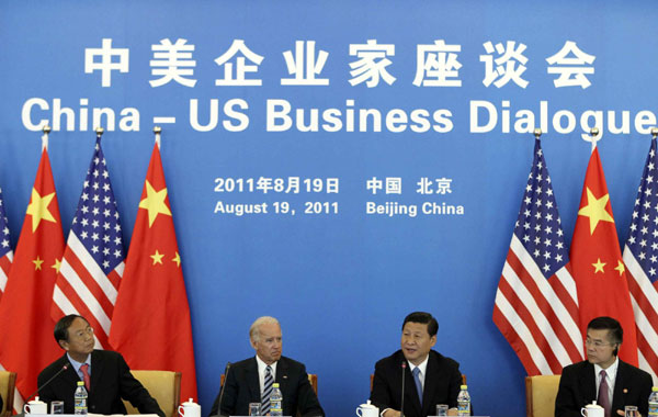 Xi, Biden talk business issues in Beijing