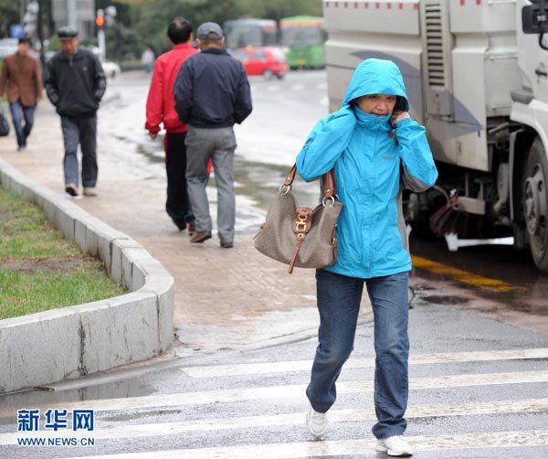 Cold front hits N China with snow