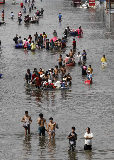 Floodwater forces evacuation in Bangkok's suburb