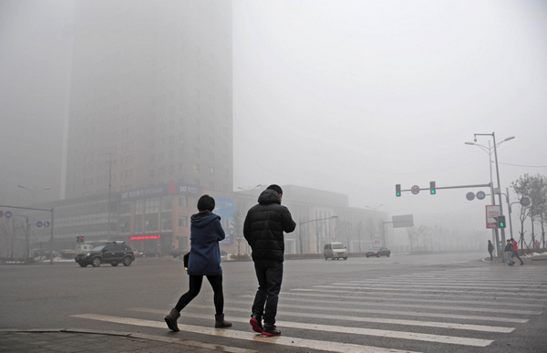 Dense fog shrouds east and north China