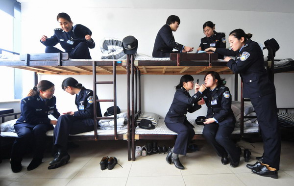 Policewomen serve on high-speed trains