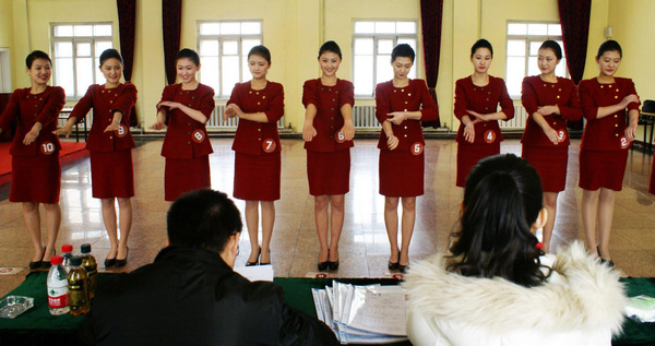 Stewardess applicants prepare for job interviews