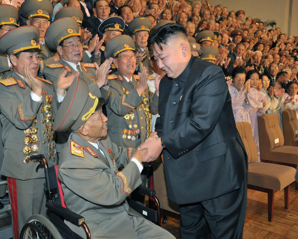 DPRK leader Kim Jong-un greets veterans