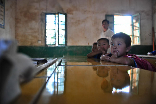 A desk for every student in C China