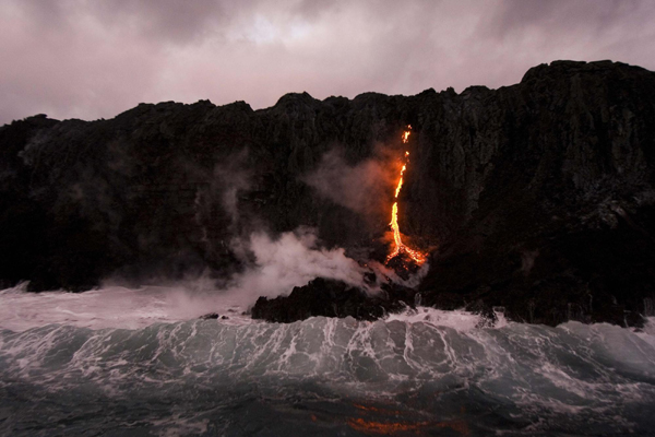 Lava oozes into ocean in Hawaii