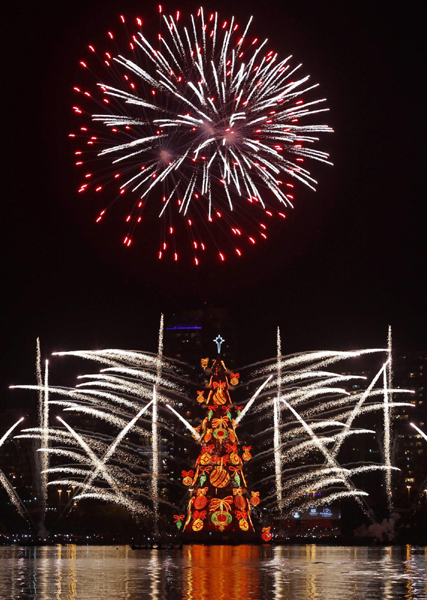 Fireworks burst over lake in Rio de Janeiro