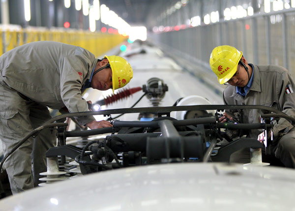 Bullet trains get check-ups before travel rush