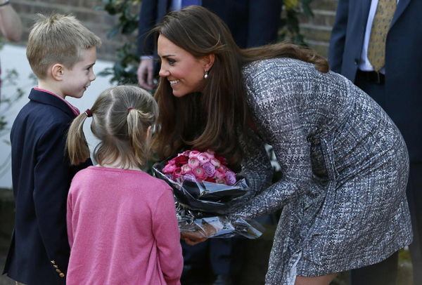 Duchess of Cambridge reveals baby bump