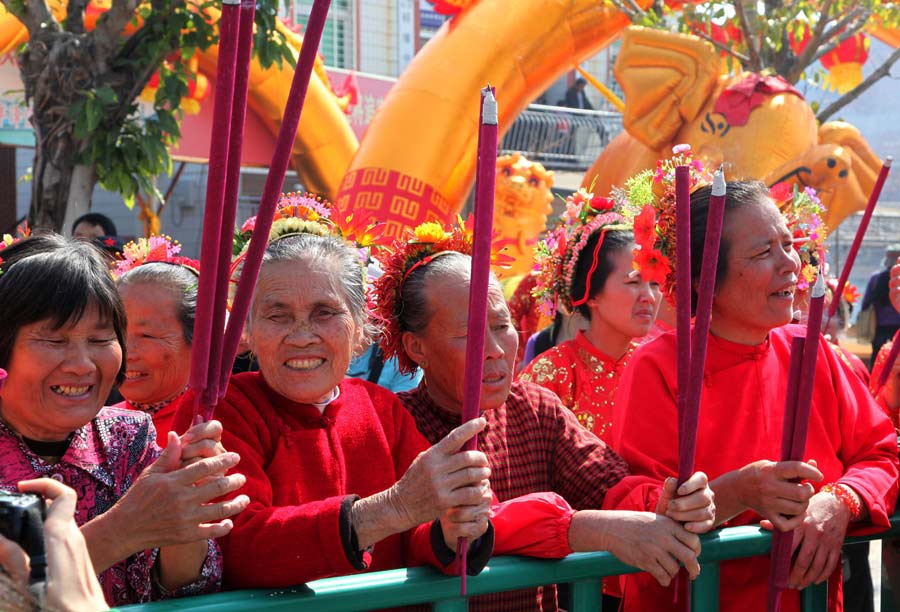 Flamboyant villagers honor sea goddess