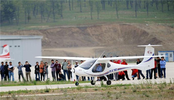 Electric light airplane conducts test flight