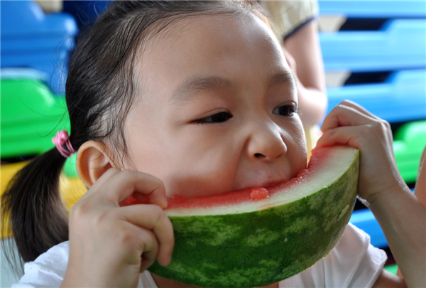 Kid's watermelon feast signals autumn 