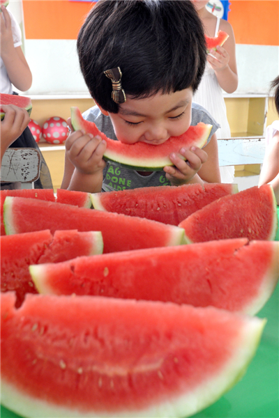 Kid's watermelon feast signals autumn 