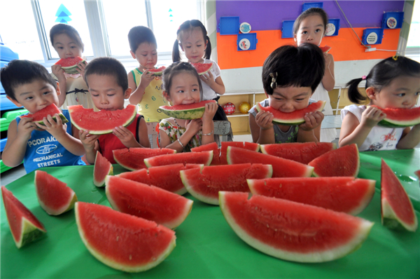 Kid's watermelon feast signals autumn 