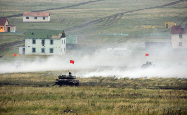 Chinese, Russian troops conduct 1st live fire exercises