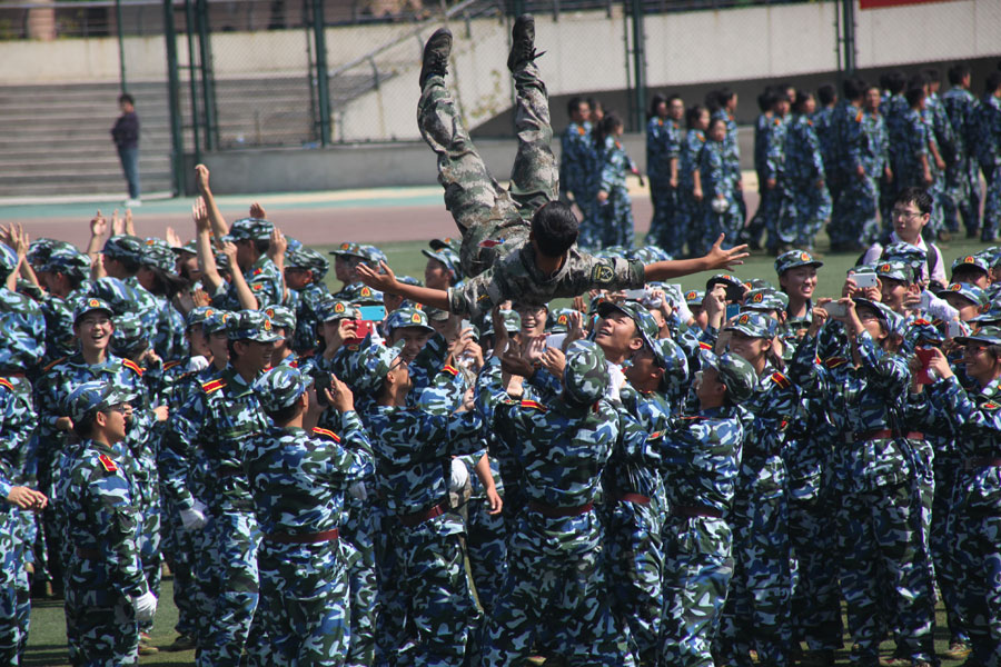 Female freshmen are unique sight in military show