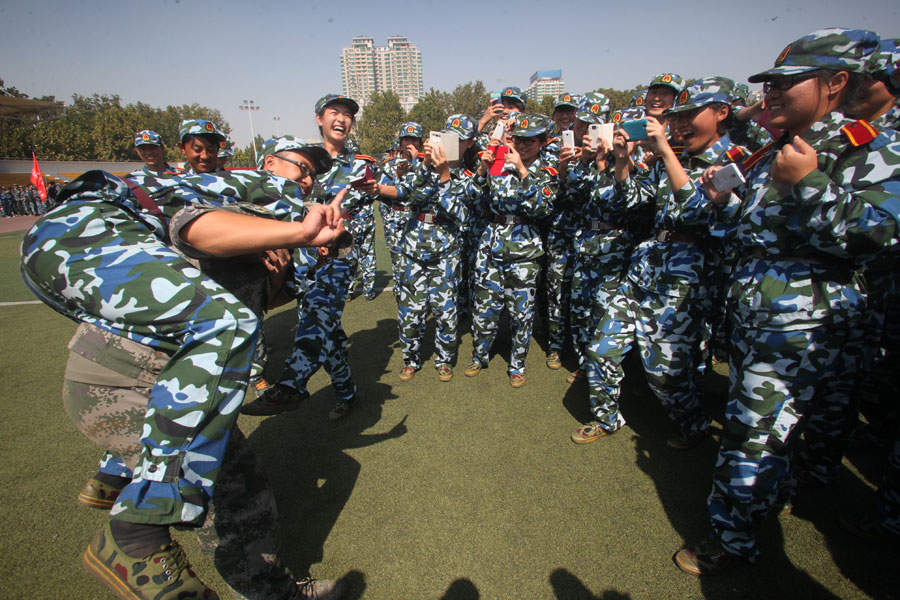 Female freshmen are unique sight in military show