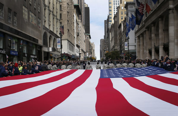 US honors its veterans with ceremonies, parades