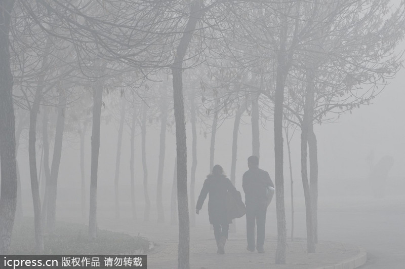 NW China city obscured by fog