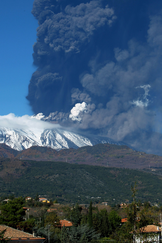 Mount Etna erupts, lighting up Sicilian sky