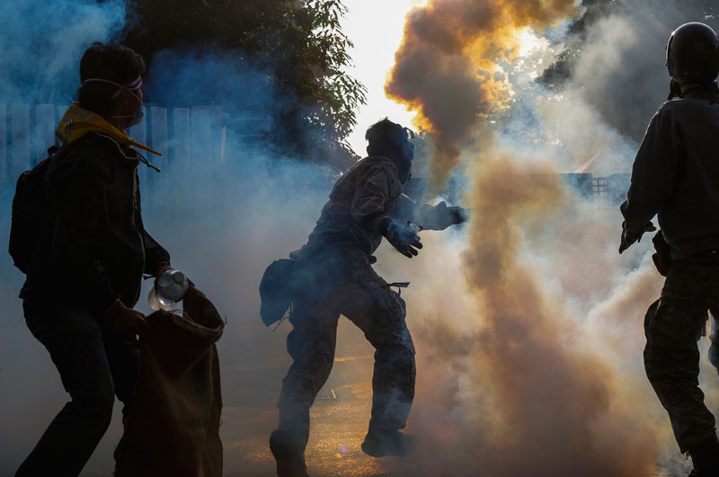 Thai police fire teargas at protesters