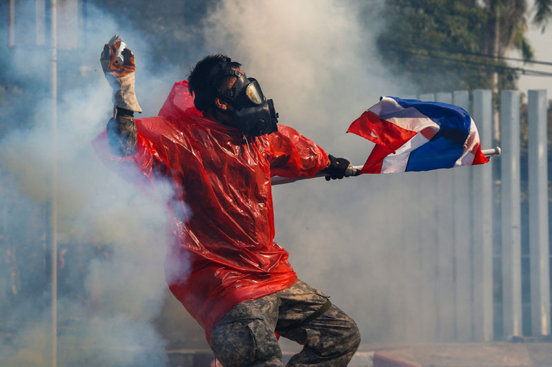 Thai police fire teargas at protesters