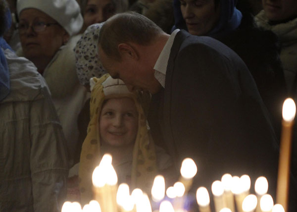 Putin attends the Orthodox Christmas