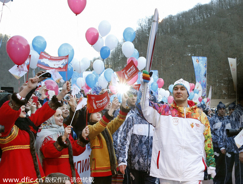 Olympic flame in Sochi after world's longest relay