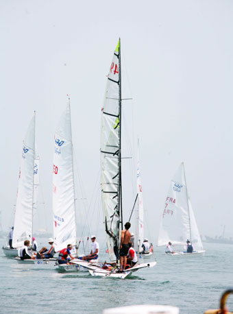 Algae cleared, Olympic sailors begin to practise normally in Qingdao