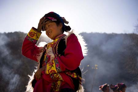 Qiang people celebrate first Spring Festival after earthquake with full hope