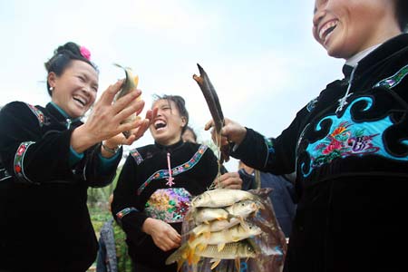 Ethnic Miao people celebrate Guzang Festival