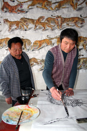 Farmer to paint 100 tigers by National Day