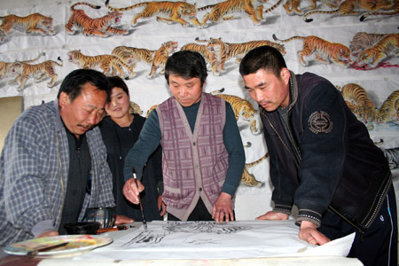 Farmer to paint 100 tigers by National Day