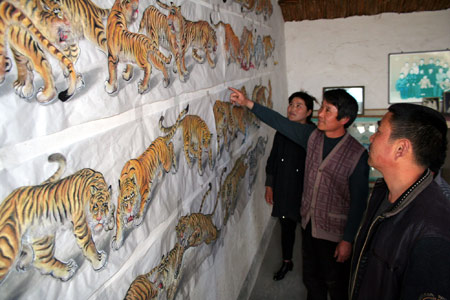 Farmer to paint 100 tigers by National Day