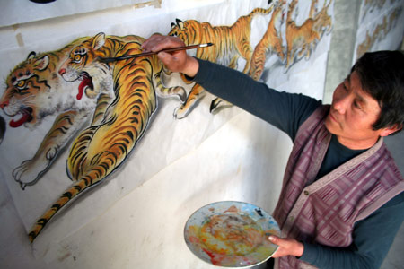 Farmer to paint 100 tigers by National Day