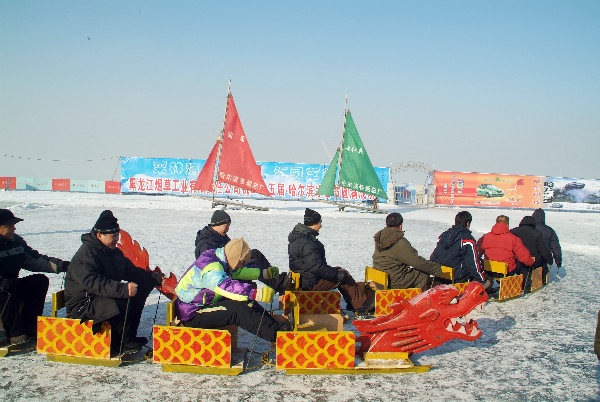 Tourists enjoy snow and ice