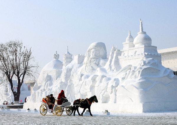 Tourists enjoy snow and ice