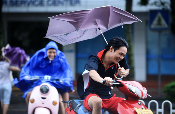 Tropical storm Jebi lands in Hainan in S China