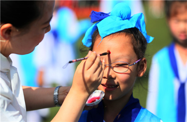 New first-graders attend traditional education activity