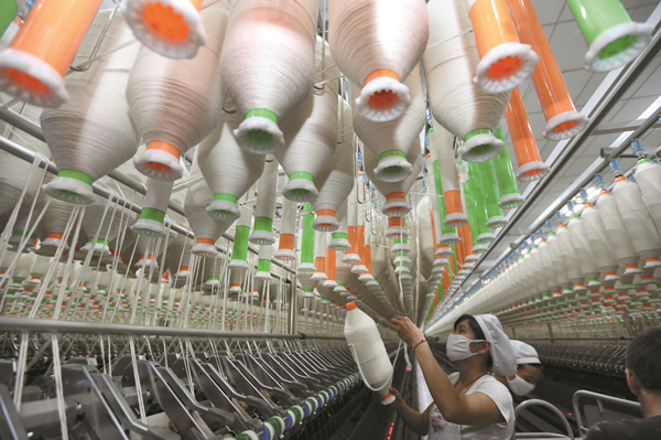 Textile firms tailor work to changing market