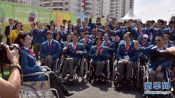 Chinese Paralympic delegates attend flag-raising ceremony