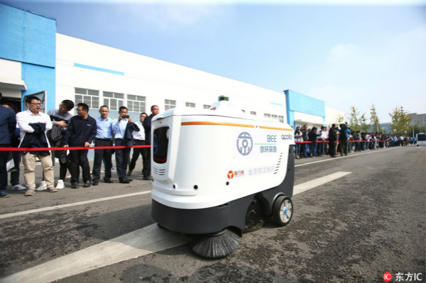 Autonomous driving sanitation vehicles unveiled in Beijing