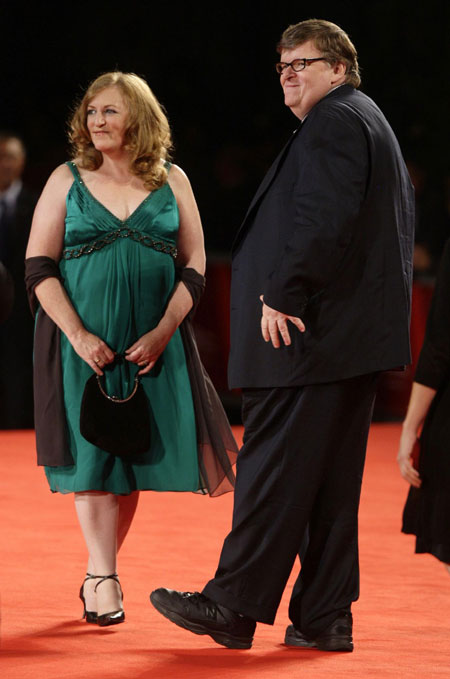 U.S. director Moore and his wife on the red carpet at the 66th Venice Film Festival