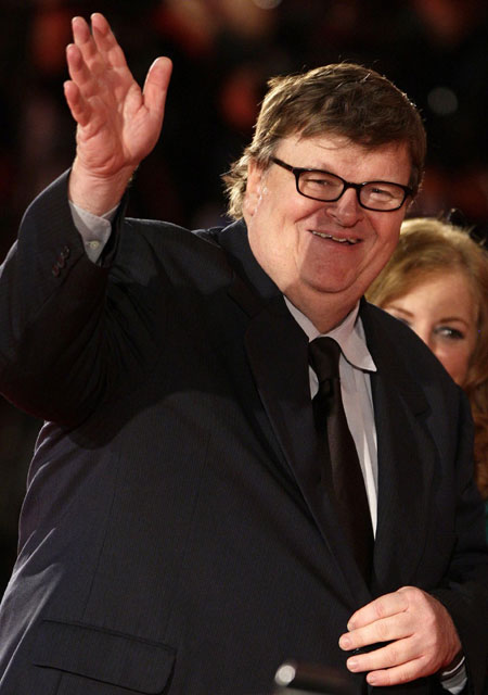 U.S. director Moore and his wife on the red carpet at the 66th Venice Film Festival