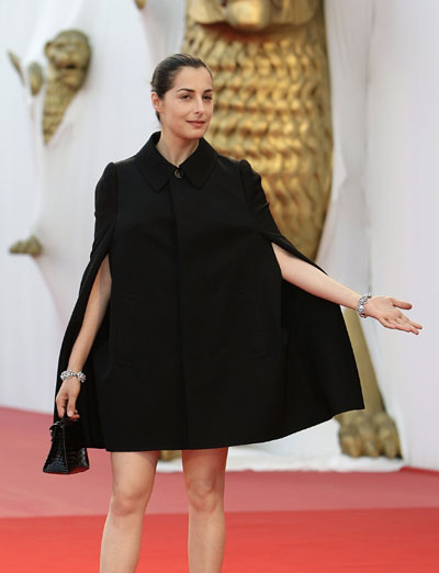 French actress Amira Casar on red carpet at Venice Film Festival