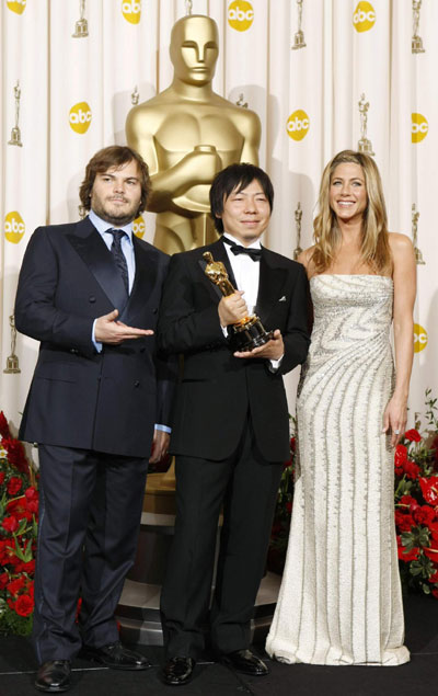 Kunio Kato holds his Oscar for best animated short film at Oscars