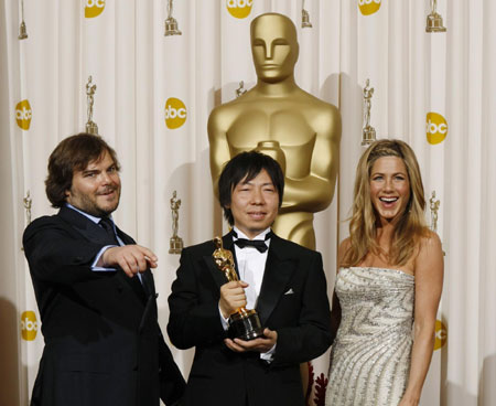 Kunio Kato holds his Oscar for best animated short film at Oscars